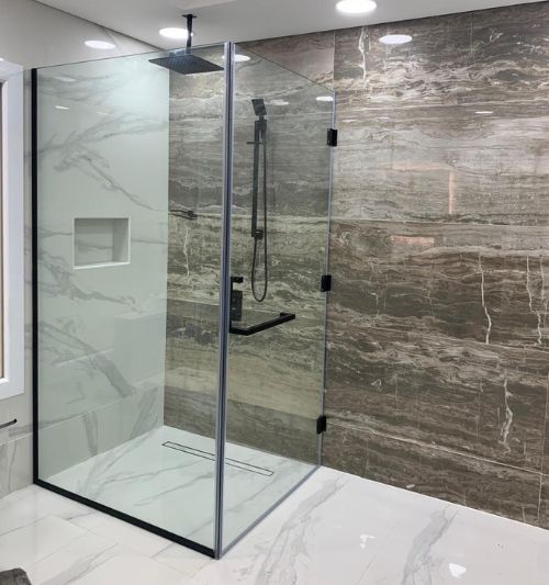 Modern bathroom mirror and glass styling for luxury apartment in Jumeirah Dubai